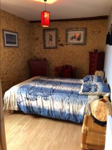 Postel nebo postele na pokoji v ubytování La Grange de Langlade