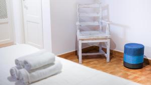 Postel nebo postele na pokoji v ubytování Hotel La Torre