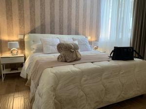 Postel nebo postele na pokoji v ubytování Pompei Luxury Suite