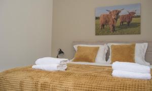 מיטה או מיטות בחדר ב-De Burcht-Drenthe