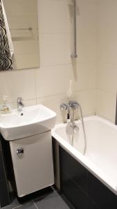 Ένα μπάνιο στο ESEN Apartamenty Centrum