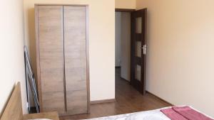 Łóżko lub łóżka w pokoju w obiekcie ESEN Apartamenty Nowy Świat