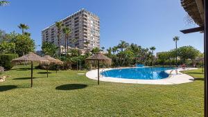 The swimming pool at or close to Stunning sea and mountains views close to the beach !