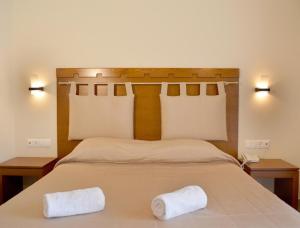 Кровать или кровати в номере Kymi Palace