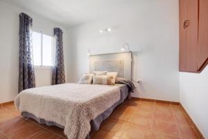 Posteľ alebo postele v izbe v ubytovaní Casa Ariadna