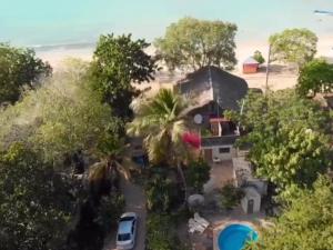 an aerial view of a house with a beach at Villa Rosa in Punta Rucia