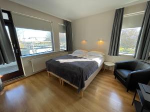 Postel nebo postele na pokoji v ubytování Guesthouse Sunna