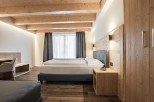 Postel nebo postele na pokoji v ubytování Chalet Alpenrose