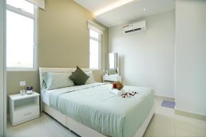 Desaru KTV Classical Elegant Style by Joyfully 2M2客房内的一张或多张床位