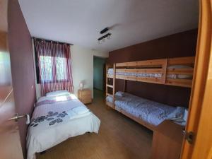 Двох'ярусне ліжко або двоярусні ліжка в номері El Rincon De Los Abuelos