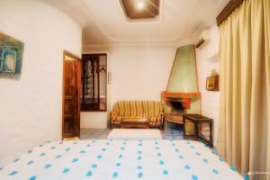 A bed or beds in a room at Casa Hassan