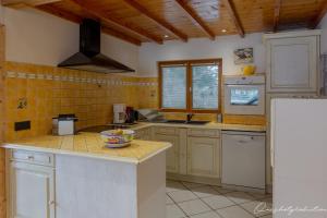 Kjøkken eller kjøkkenkrok på Boost Your Immo Les Deux Alpes 527