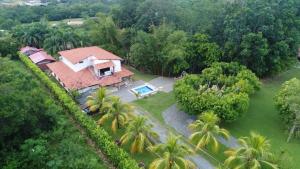 an aerial view of a house with a swimming pool at Casa Campo Emaus in Caucasia