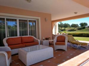 Posedenie v ubytovaní Casa La Familia