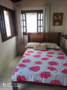 En eller flere senge i et værelse på Cantinho de Barê