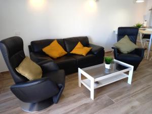 Posedenie v ubytovaní Apartamentos Medano - Marineda Medano