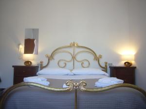 Postel nebo postele na pokoji v ubytování BeeLiving Room&Breakfast