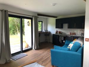 A kitchen or kitchenette at Conkers - a new bespoke rural escape near Glastonbury