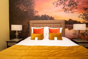 מיטה או מיטות בחדר ב-Bridleways Guesthouse & Holiday Homes