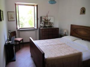 Een bed of bedden in een kamer bij Casalilliput