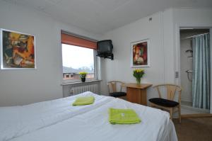 Letto o letti in una camera di Thyregod Kursuscenter