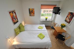 Letto o letti in una camera di Thyregod Kursuscenter