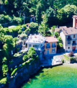 an aerial view of a large white house at B&B Le Darsene in Cannobio