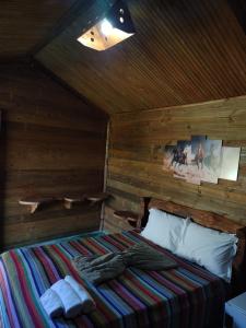 Кровать или кровати в номере Pousada Rancho Sêmani