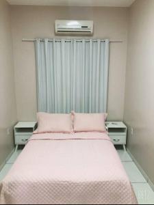Tempat tidur dalam kamar di Toni Star