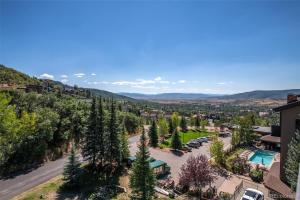 an aerial view of a resort with a pool at Bear Claw 402 - Ski-in Ski-out Condo! in Steamboat Springs