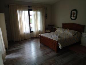 En eller flere senge i et værelse på La Tina + 74 billeder