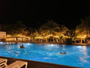 Bazén v ubytování Resort Playa Azul Departamentos frente al mar nebo v jeho okolí