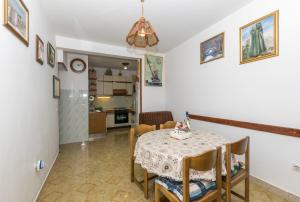 Kuchyň nebo kuchyňský kout v ubytování Apartments Neno