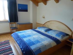 Ένα ή περισσότερα κρεβάτια σε δωμάτιο στο Appartamenti Valpinoi