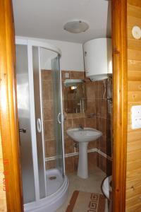 Koupelna v ubytování Apartments Breza