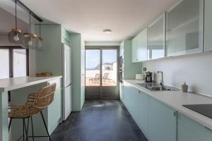 A kitchen or kitchenette at La Reserva