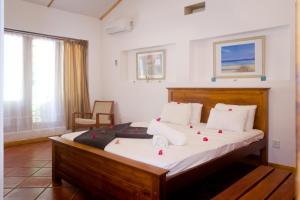 Ένα ή περισσότερα κρεβάτια σε δωμάτιο στο Clove Garden Kandy