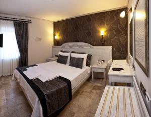 Postelja oz. postelje v sobi nastanitve Assos Behram Special Class Hotel Adults Only