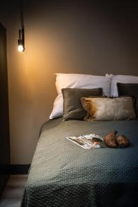 A bed or beds in a room at City Stay&Go Enschede