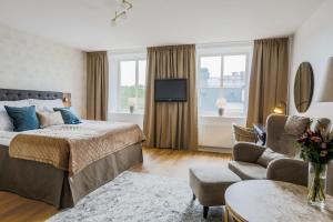 Postel nebo postele na pokoji v ubytování Home Hotel Cardinal + 37 fotografií