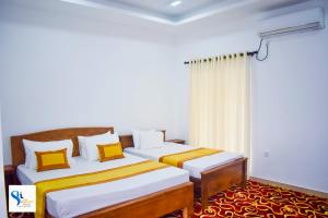 Postel nebo postele na pokoji v ubytování Hotel Summer Haven + 20 fotografií
