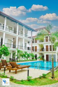 an image of a hotel with a swimming pool at Hotel Summer Haven in Polonnaruwa