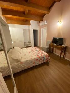 Postel nebo postele na pokoji v ubytování Albergo Diffuso Borgo Retrosi di Amatrice