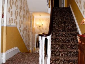 A bed or beds in a room at Bay House 