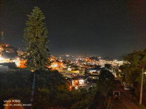 Nespecifikovaný výhled na destinaci Kodaikānāl nebo výhled na město při pohledu z bed and breakfast