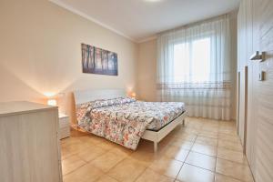 Ένα ή περισσότερα κρεβάτια σε δωμάτιο στο Exclusive Villa le Palme