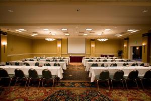 a large room with tables and chairs in it at FairBridge Inn, Suites & Conference Center – Missoula in Missoula