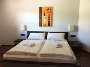 Ein Bett oder Betten in einem Zimmer der Unterkunft Chalet CityXPress Zell am See