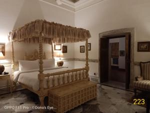 Postel nebo postele na pokoji v ubytování The Rajbari Bawali