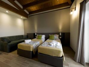 Un pat sau paturi într-o cameră la Baita Pavò